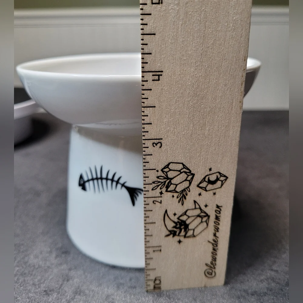 White Ceramic Elevated Cat Dish with Black Fish Skeleton Design